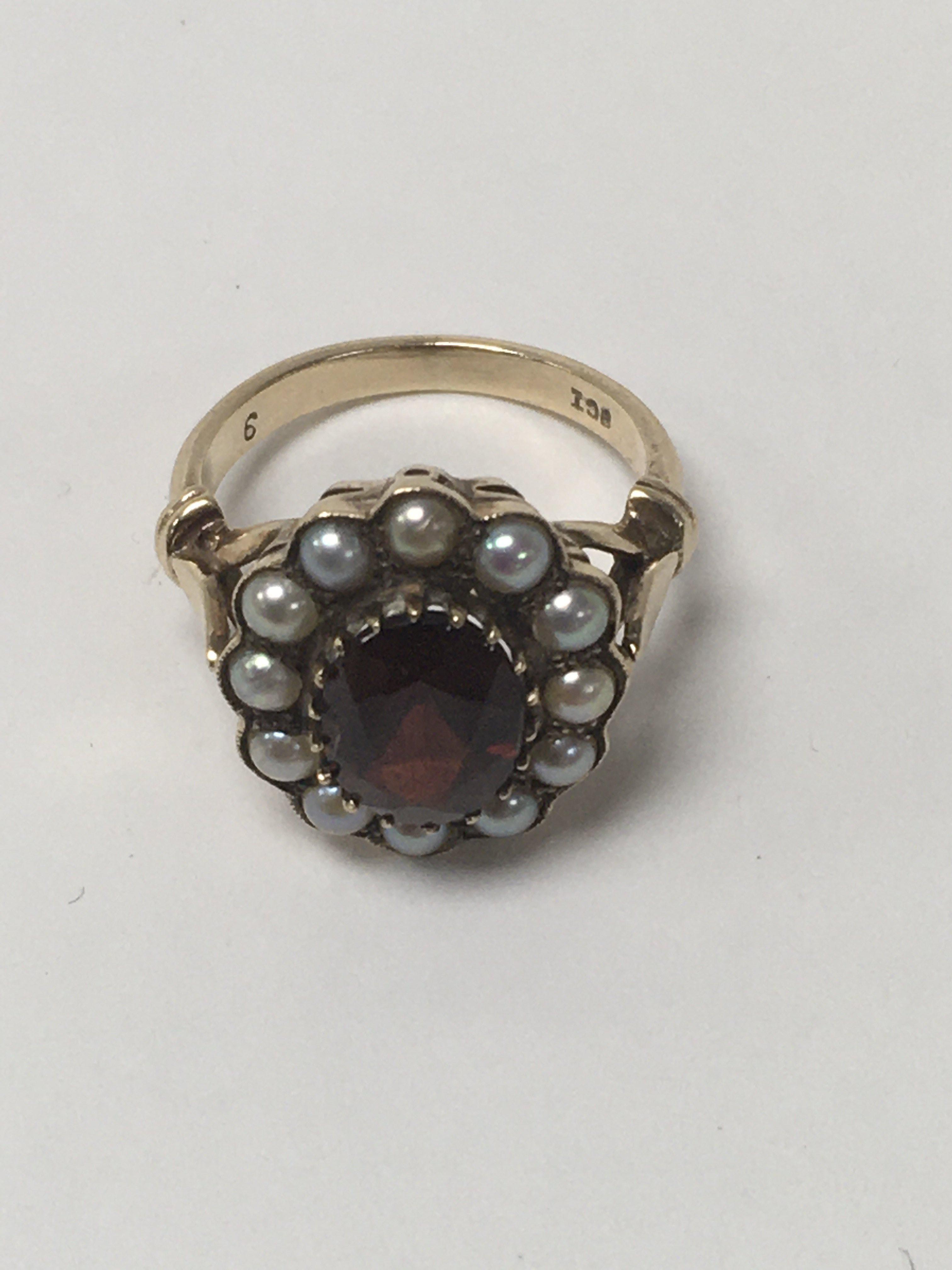 A 9 ct gold Victorian style ring inset with a cent