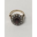 A 9 ct gold Victorian style ring inset with a cent