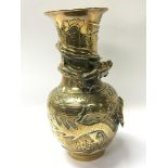 A Chinese late 19th century brass vase decorated w