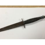 An old Fairbrain- Sykes commando fighting knife conforming to 3rd Pattern FS fighting knife with a