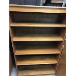 A Modern teak Nathan Book case, approx 153cm in he