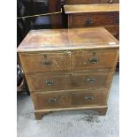 A small 4 draw oak framed walnut veneered chest of