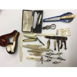 A collection of objects including cased pipe , wat