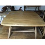 A Ercol occasional table the square top above a un