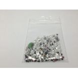 A bag of loose mixed stones including cubic zircon