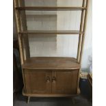 A Ercol open bookcase with three open selfs and cu