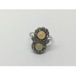 An unusual 18ct white gold Victorian ring set with