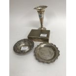 A collection of silver comprising trumpet vase cig