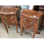 A pair of French style sets of drawers with gilt m