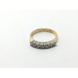 An 18ct gold seven stone diamond ring, diamonds ap