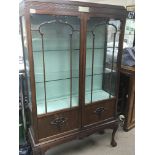 A Mahogany display cabinet with closed fretwork de