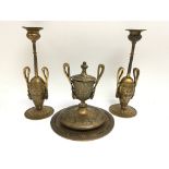 An unusual gilt brass desk set engraved with a flo