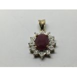 A 9ct gold oval cut ruby and RBC diamond cluster p