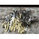 A collection of silver plated cutlery.