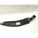 A Kukri knife with a horn handle.