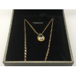 A 9ct gold and aquamarine set pendant and chain.