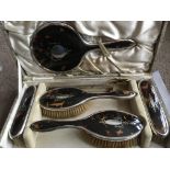 A cased silver and tortoiseshell pique work dressi