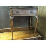 A small walnut veneered single draw side table.