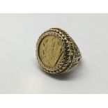 A gold sovereign ring, coin dated 1902, approx 10.