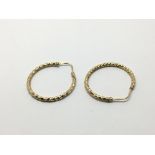 A pair of 9ct gold hoop earrings, approx 2.8g.