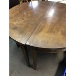 A Georgian mahogany d end / circular dining table