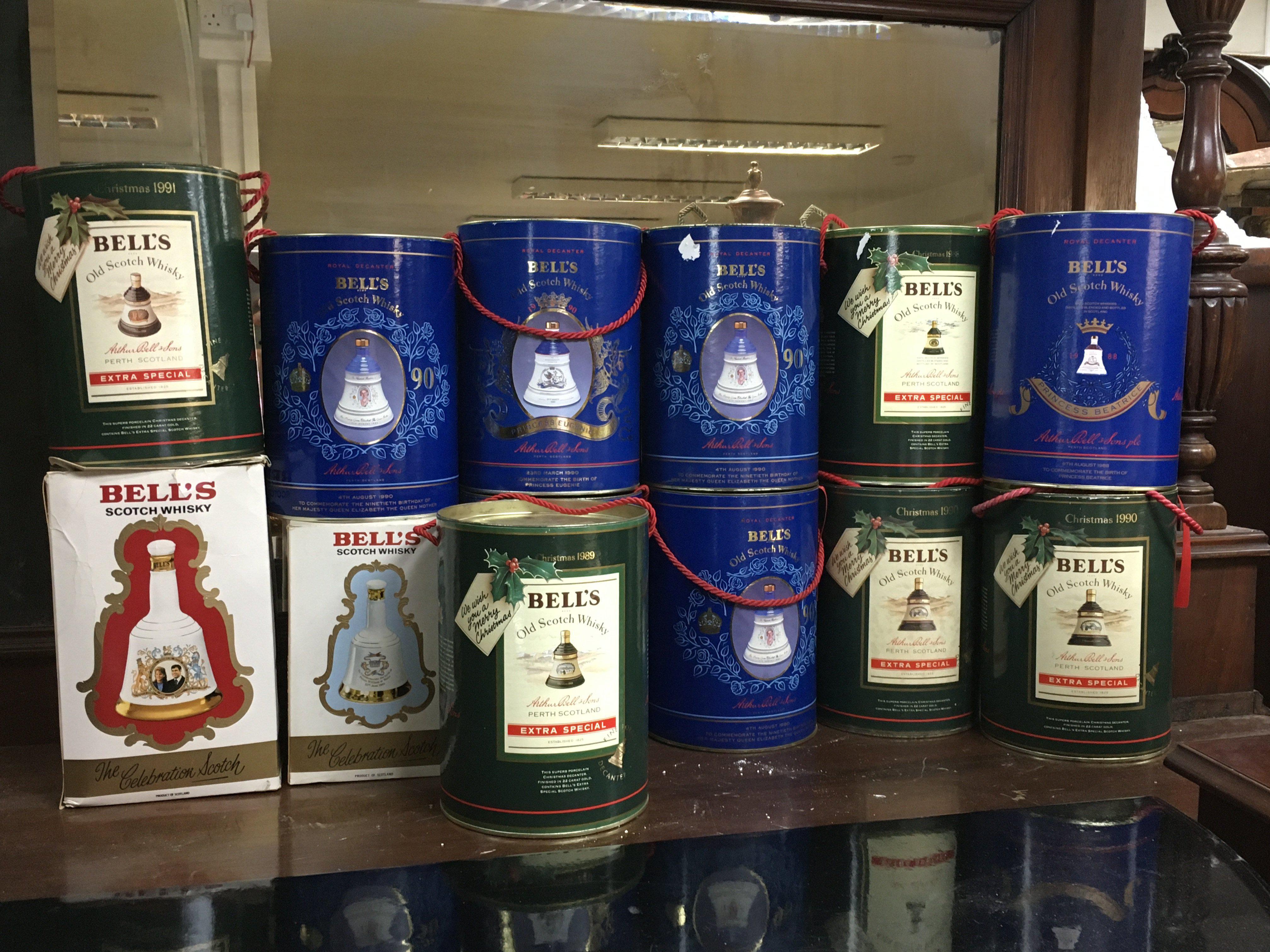 A large collection of unopened bells whisky decanters. (13)