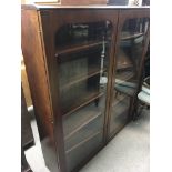 A Victorian mahogany bookcase the pair of glazed d