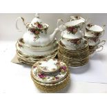 A Royal Albert country Roses patter tea and part d