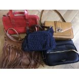 Five handbags comprising two leather examples and