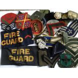 A collection of military patches together with a s