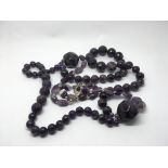 A purple agate necklace with facet cut and round s