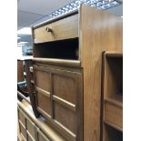 A Modern teak Nathan Cabinet with draw and cupboar