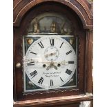 A Victorian mahogany long case clock the arched di