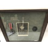 A WW2 Framed German Iron Cross 2nd class & Black w