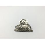 A German Volkswagen Factory Workers Badge dated 19