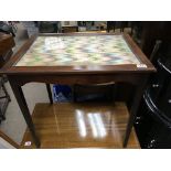 A Mahogany occasional table the glass top inset wi