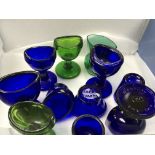 A collection of Bristol blue and green antique eye wash glasses some stamped made in England (10)