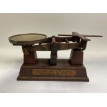 A set of brass and iron beam balance scales by G.S