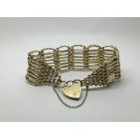 A 9ct gold gate bracelet, approx 35.2g.