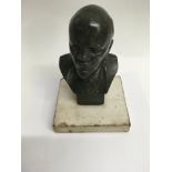 A small bronzed bust on marble base 16 cm .