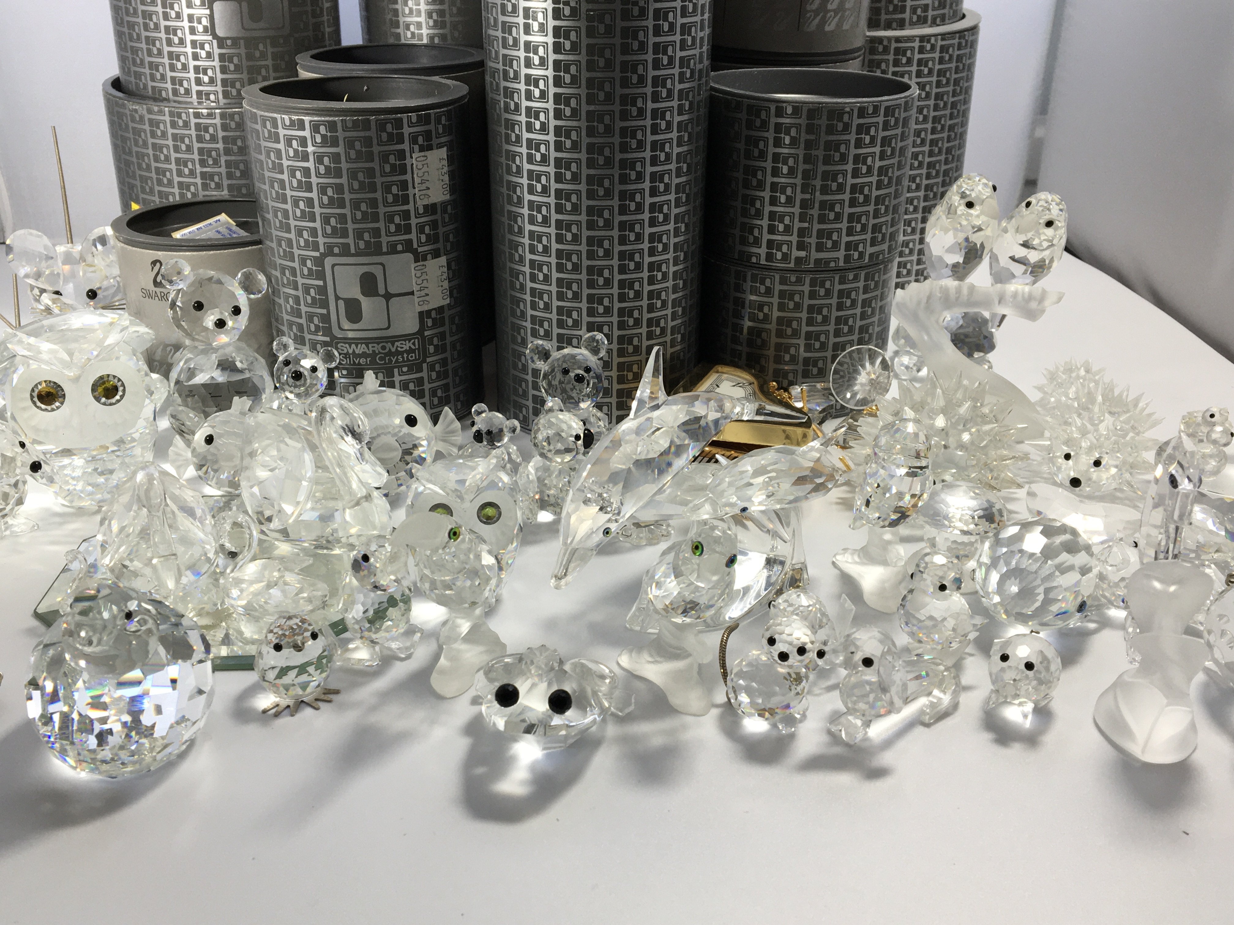 A collection of Swarovski silver Crystal and cryst