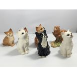 A collection of Beswick cat and Kittens most with