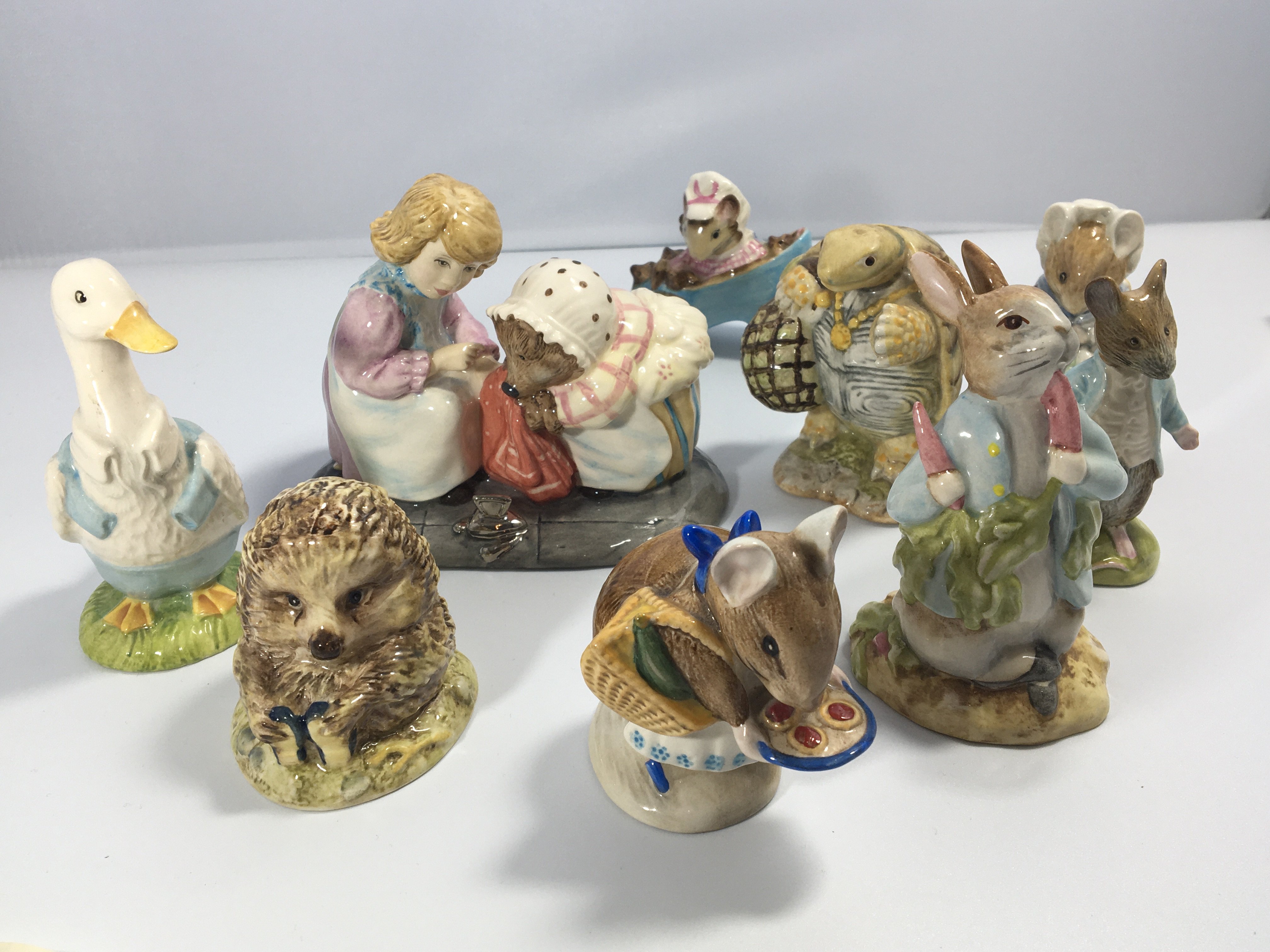 A collection of nine Beswick and Royal Albert Beat