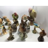 A collection of Bird ornaments including Beswick D