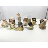 A collection of ten Beswick and Royal Albert Beatr