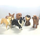 A collection of six Beswick medium size dog figure