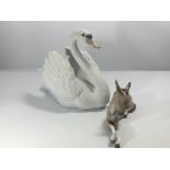 A large Lladro figure of a swan Hight 19cm and one