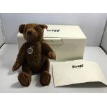 A boxed Steiff Teddy Bear 28 with paperwork and al