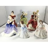 A collection of seven Royal Doulton lady figures i