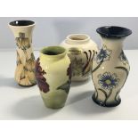 Four small Moorcroft vases including one with an e